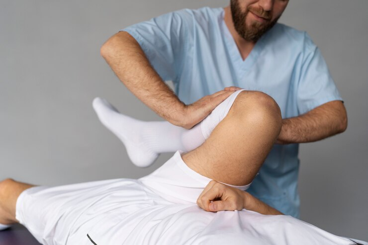 physiotherapist-helping-patient-front-view_23-2149866154
